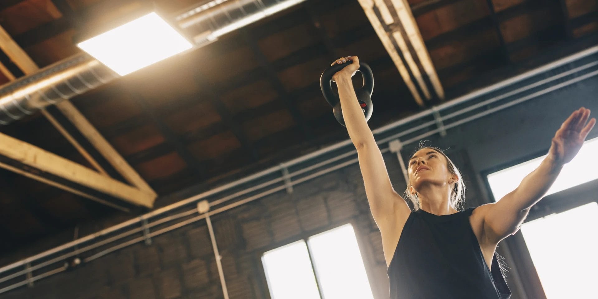 Woman excercising with kettlebell